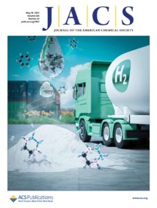 The cover of JACS, showing a heap of powder representing a synthesised compound that can be used for hydrogen storage.