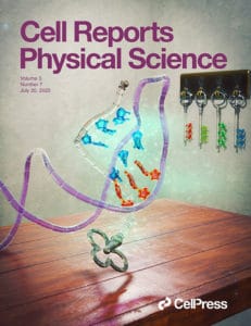 The fron cover of Cell Reports Physical Science. The cover shows a set of keys representing RNA bases along with a strand of RNA on a table.
