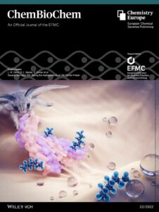 Front cover design of ChemBioChem. The cover art shows a silk moth releasing a protein, along with water droplets sliding on a silk cloth. When fluorine-containing molecules bind to this protein the silk becomes hydrophobic.