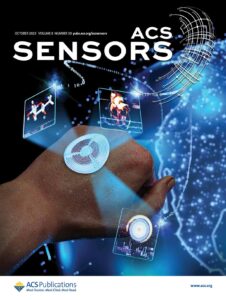 A cover design for ACS Sensors. The image shows a hand with a wearable device that monitors sweat and analyses it.
